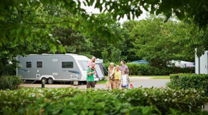 Haven holiday parks: family on walk around park